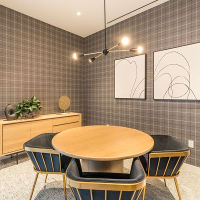 conference roomwith round table and overhead lighting