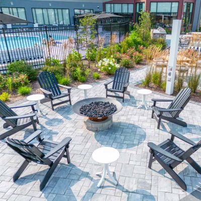 fire pit and pool in background